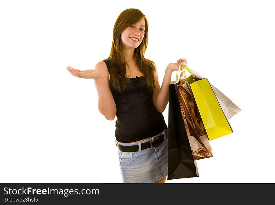 Beautiful young business lady indicating and shopping, looking happy, isolated on white.