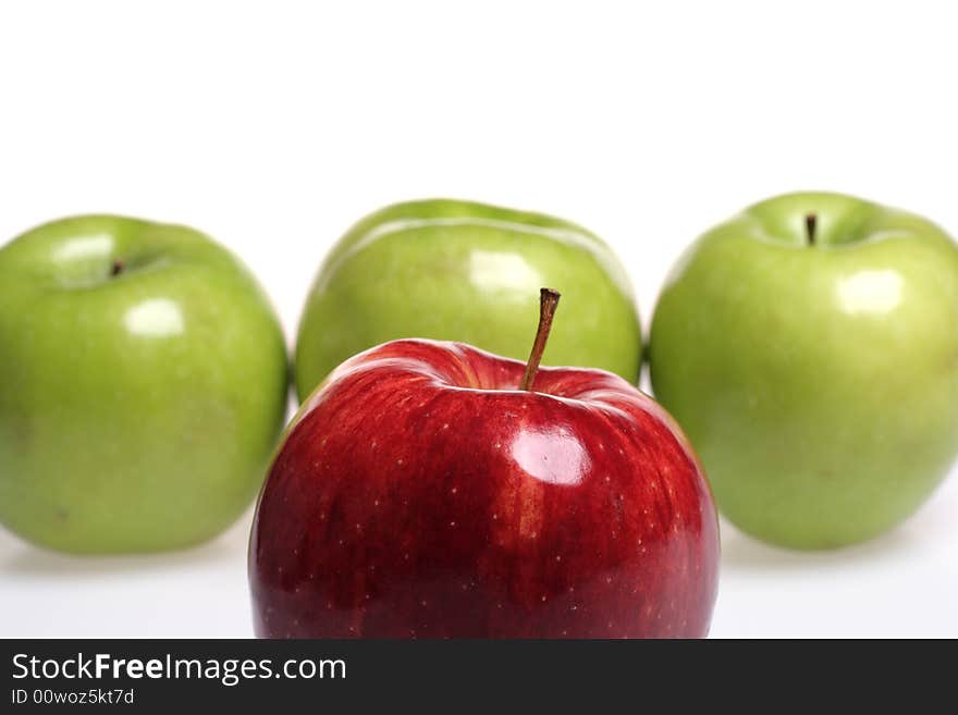 Red and green apples isolated on white background