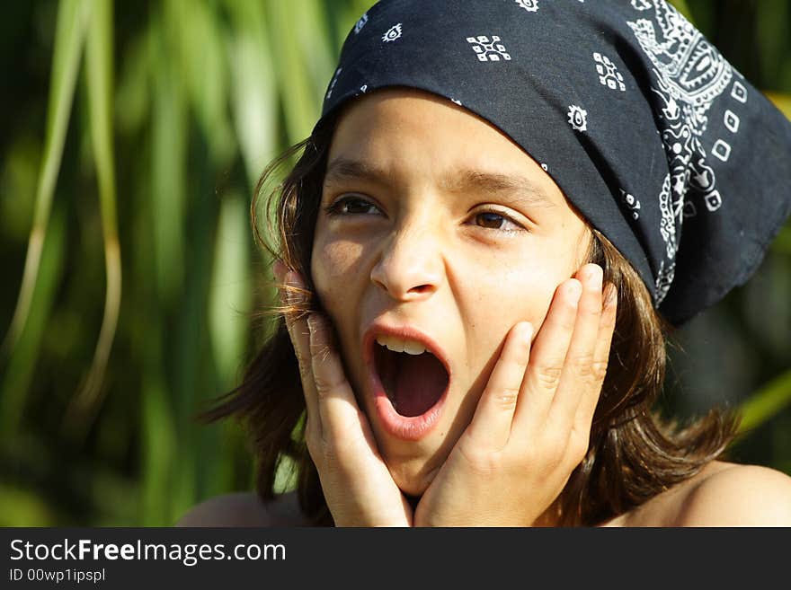 Boy displaying a shocked facial expression. Boy displaying a shocked facial expression.