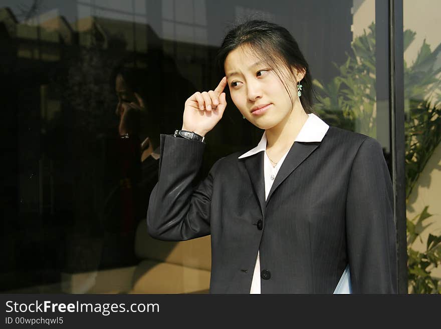 Young Business Women With File