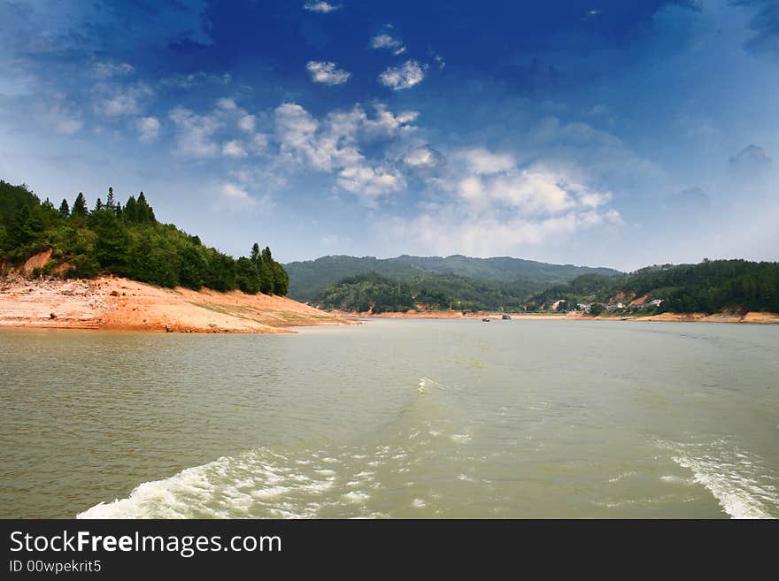 Blue sky green lake china. Blue sky green lake china