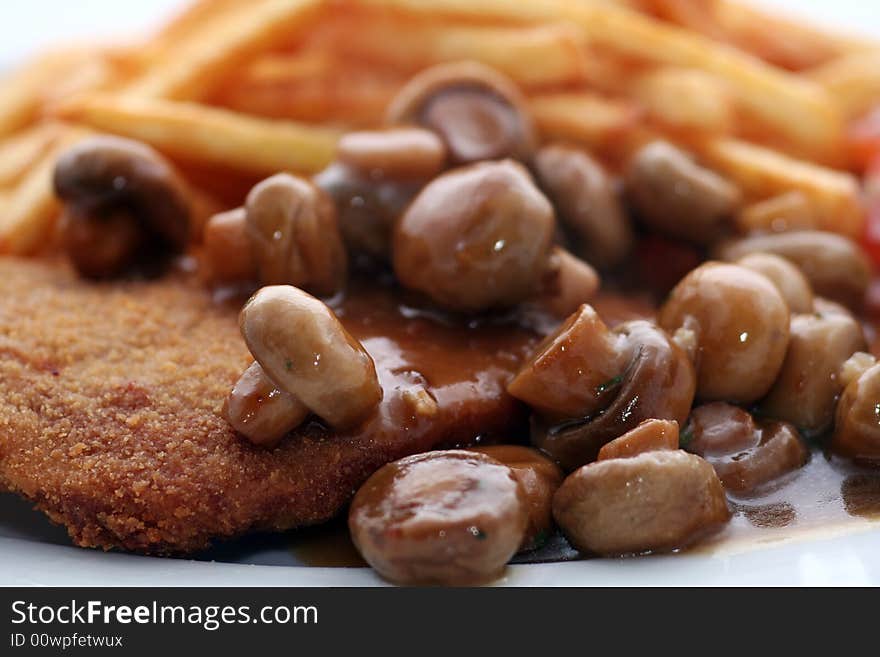 Meat with mushrooms and pommes. Meat with mushrooms and pommes