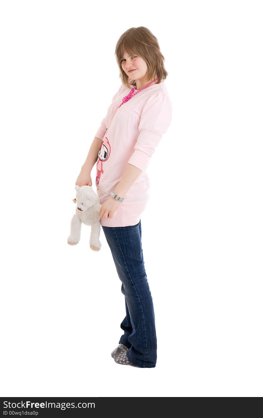 The young girl with a teddy bear isolated on a white background