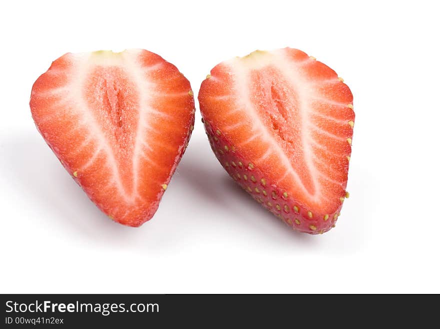 Strawberry halves on a white background