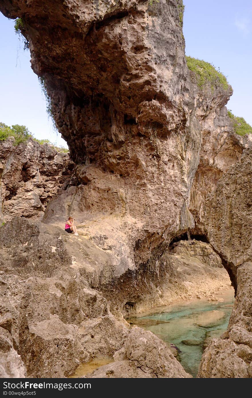 Talava arch - the sea has eroded the coral rock to form this archway.