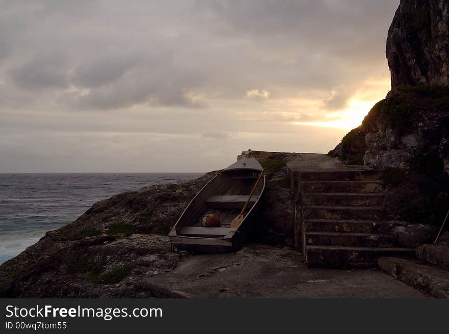 Fishing boat pulled up on the reef - Niue island. Fishing boat pulled up on the reef - Niue island.