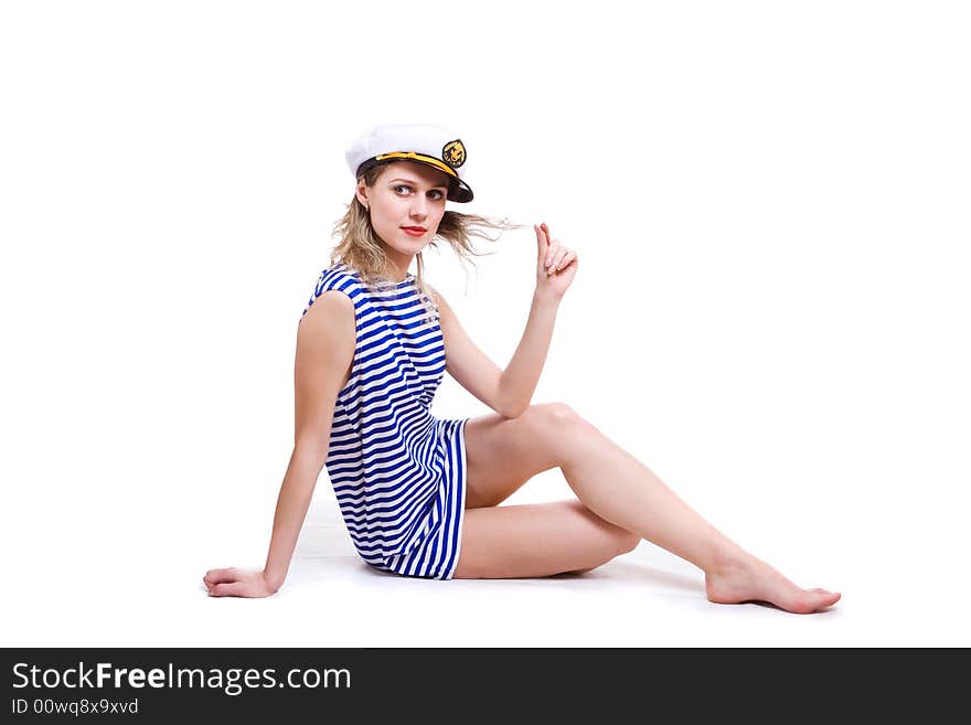 Sea captain in striped clother is seating and relax. Isolated in white. Sea captain in striped clother is seating and relax. Isolated in white