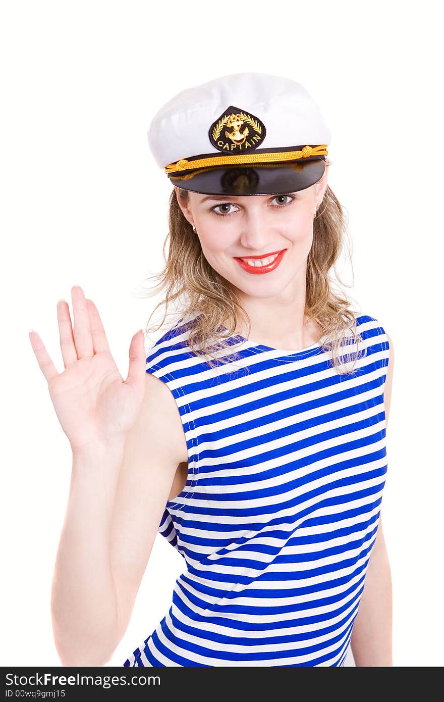 Sea captain in striped clother and his captain hat, wag by hand. Isolated in white. Sea captain in striped clother and his captain hat, wag by hand. Isolated in white