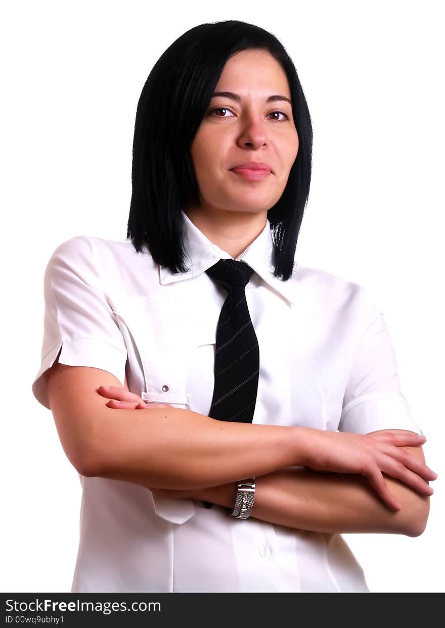 A portrait about a young elegant pretty businesswoman with black hair who is smiling and she wears a white shirt and a black tie. A portrait about a young elegant pretty businesswoman with black hair who is smiling and she wears a white shirt and a black tie