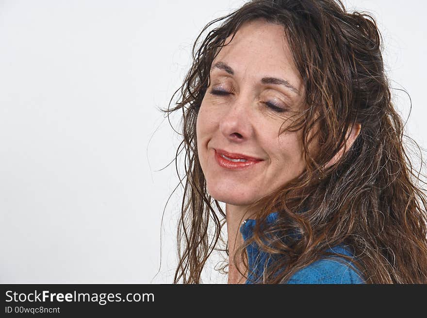 Attractive middle-aged caucasian woman with long brown hair. Attractive middle-aged caucasian woman with long brown hair.