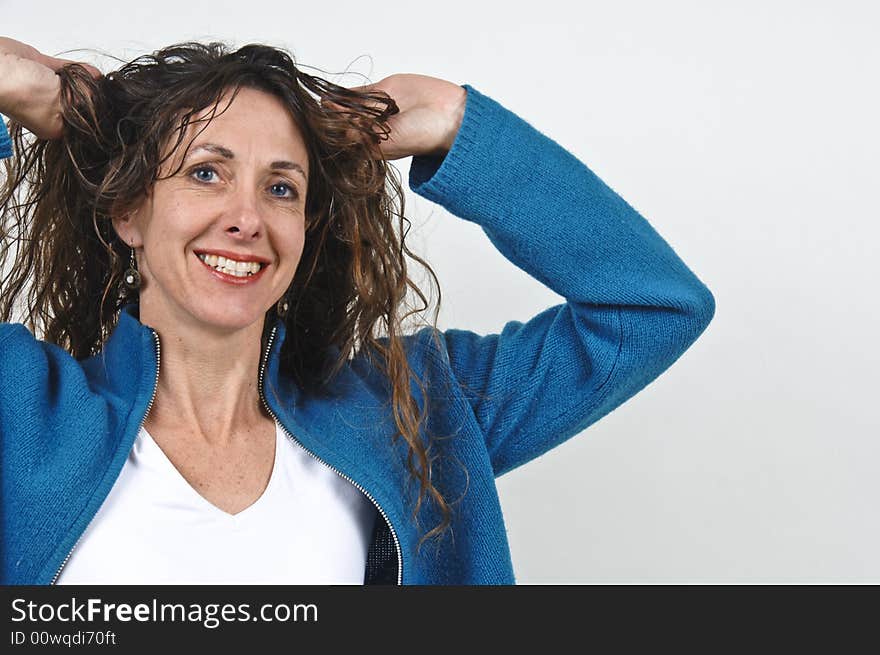 Attractive middle-aged caucasian woman with long brown hair. Attractive middle-aged caucasian woman with long brown hair.