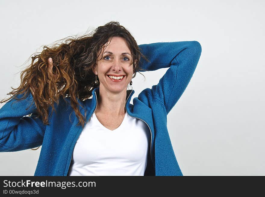 Attractive middle-aged caucasian woman with long brown hair. Attractive middle-aged caucasian woman with long brown hair.