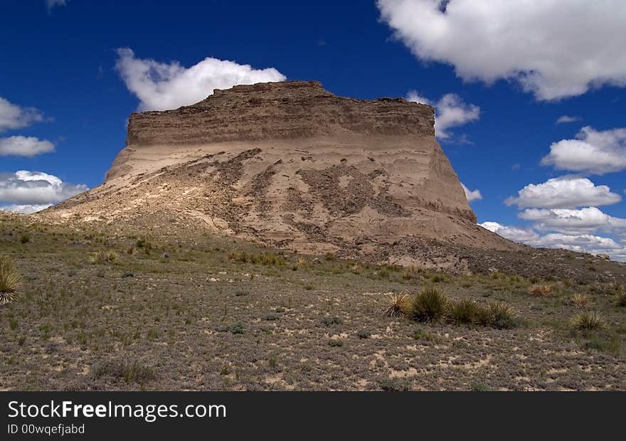 Butte And Blue Sky