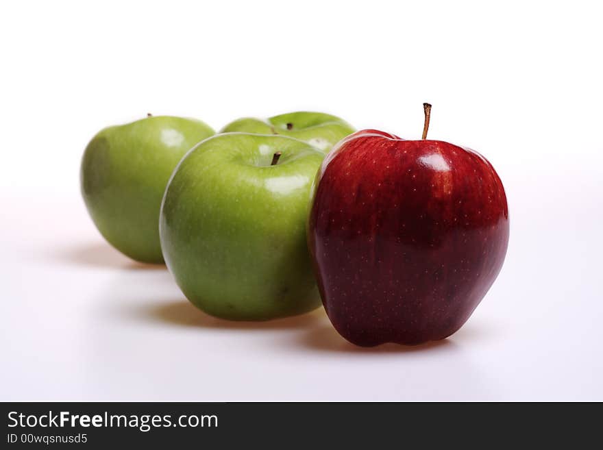 Red and green apples isolated on white background