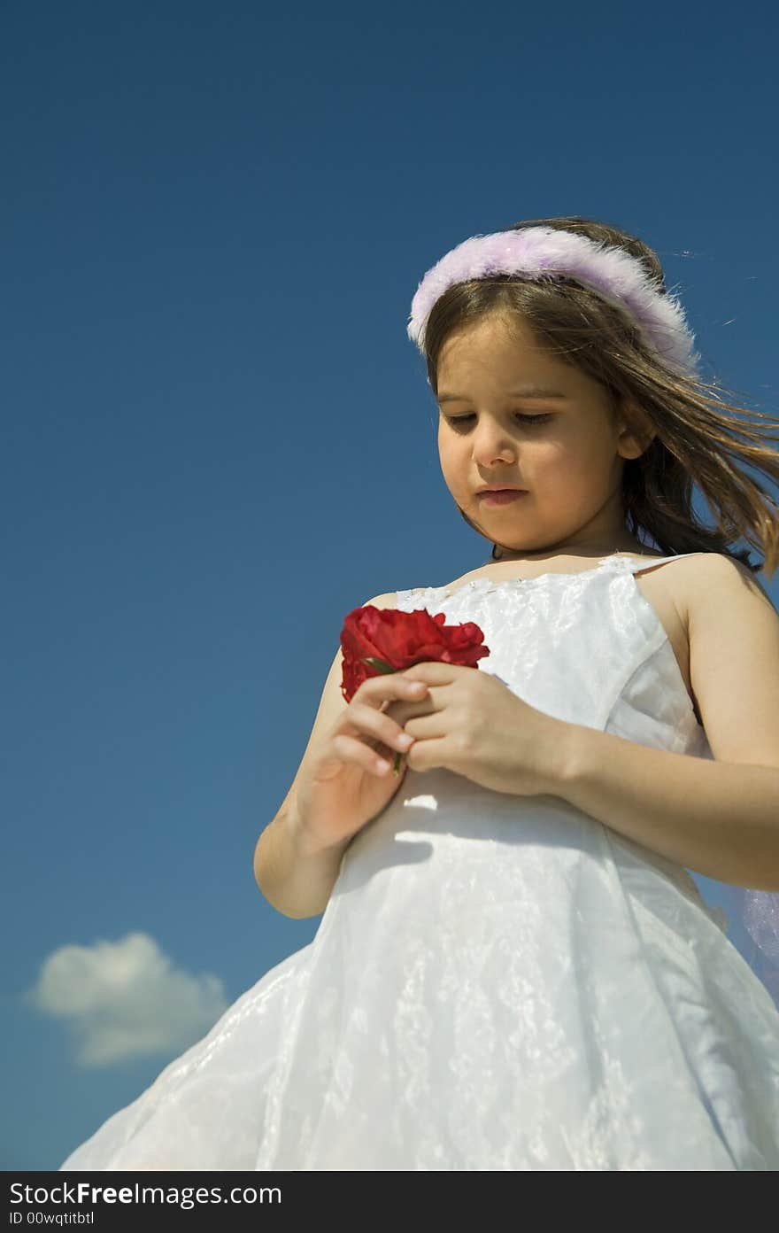 Girl holding red roses