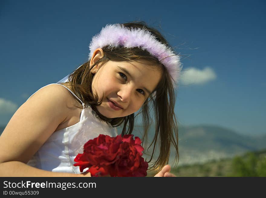 Girl holding red roses