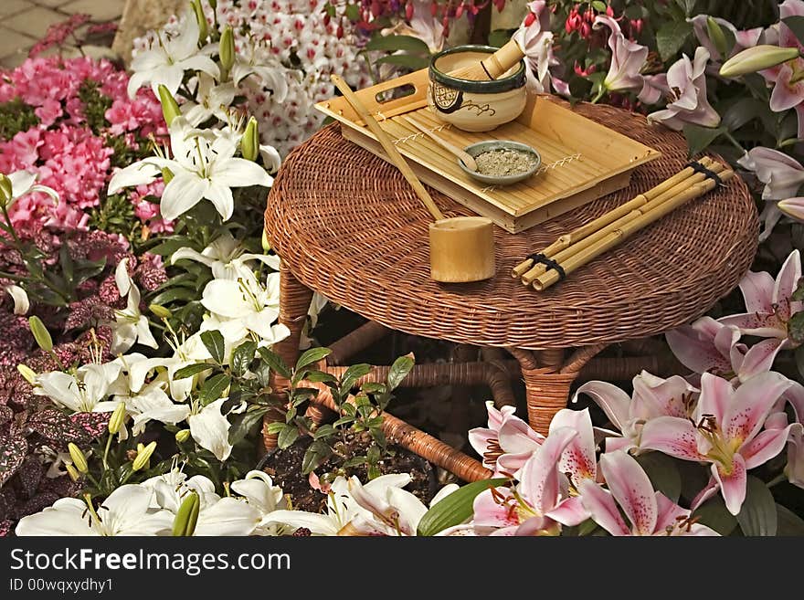 Traditional Japanese Tea Set surrounded by flowers