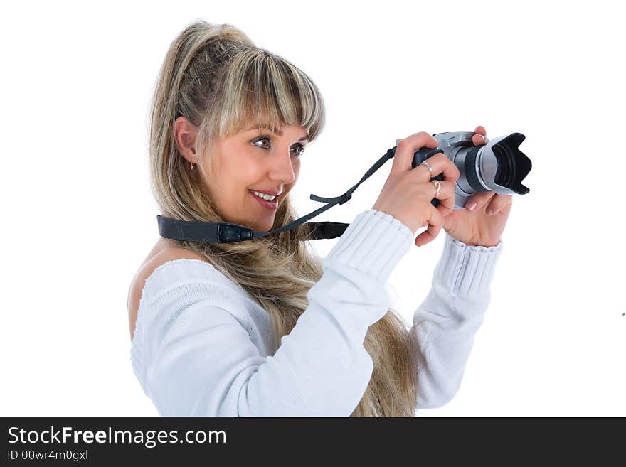 Woman with camera on white background