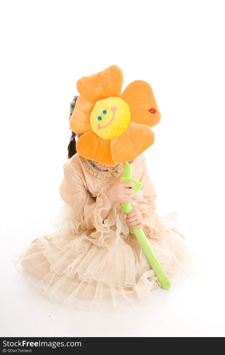 The young girl with flower isolated on a white