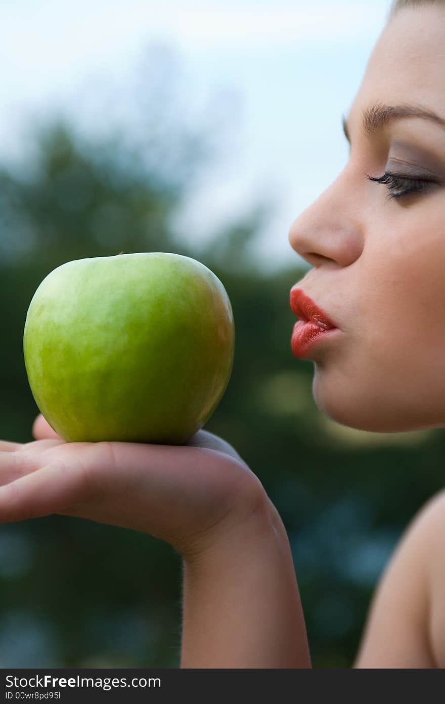 Girl With Apple On Sunset