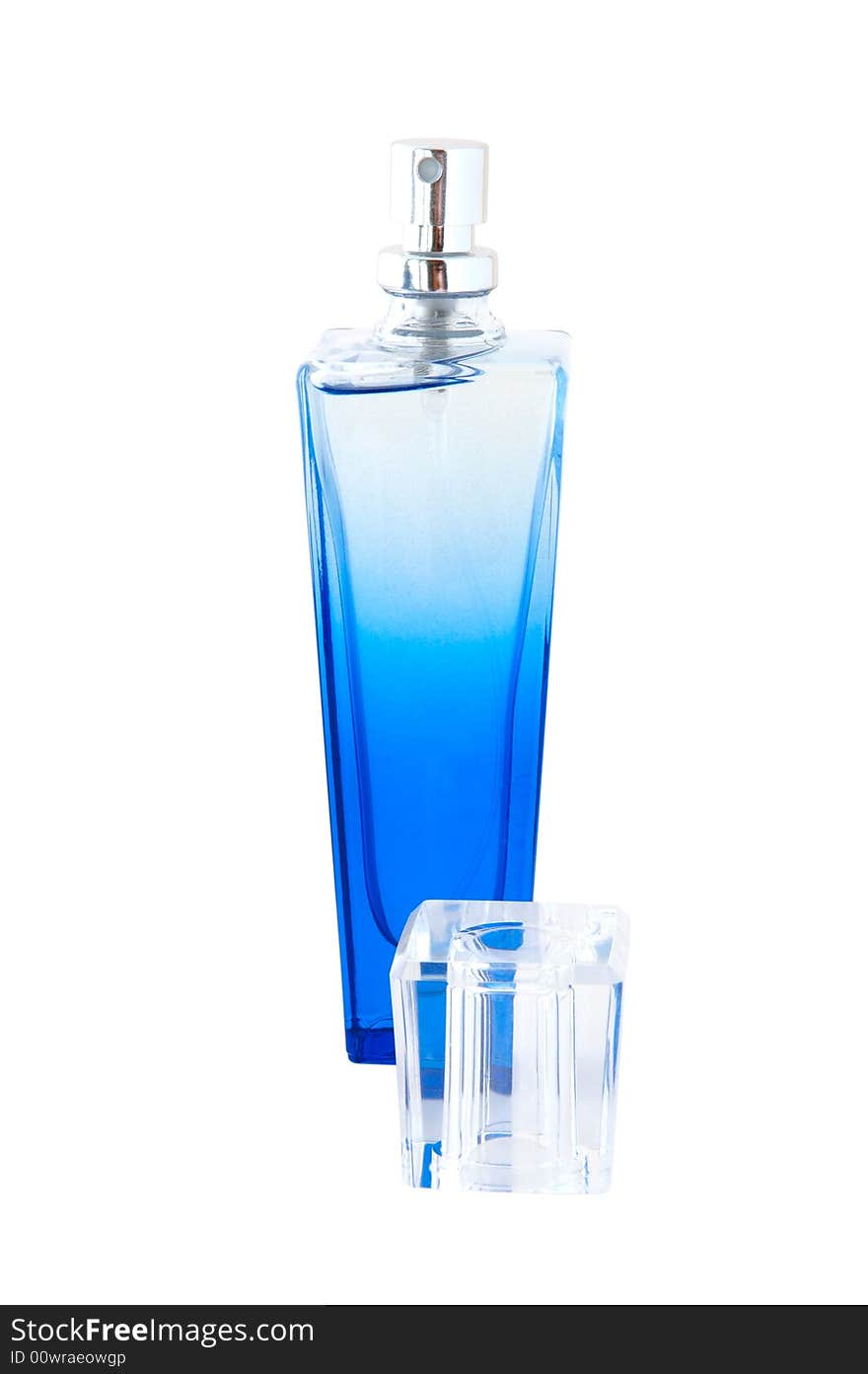 Perfume in deep blue scent-bottle.