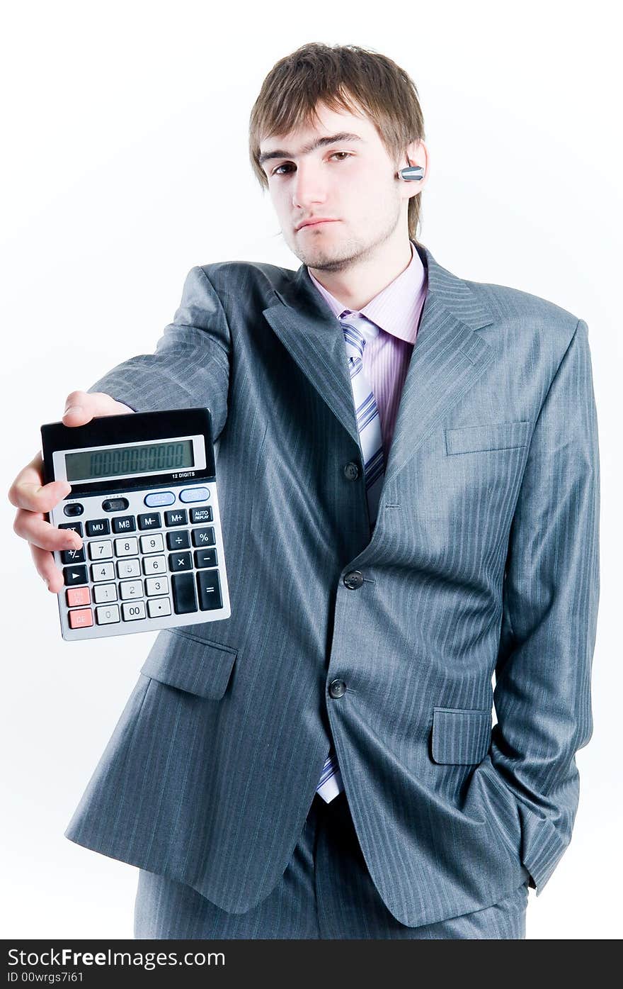 Tired businessman with calculator, isolated on white background