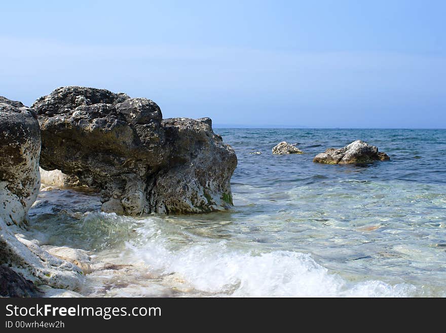 Sea tide and a rock, shot in Crimea