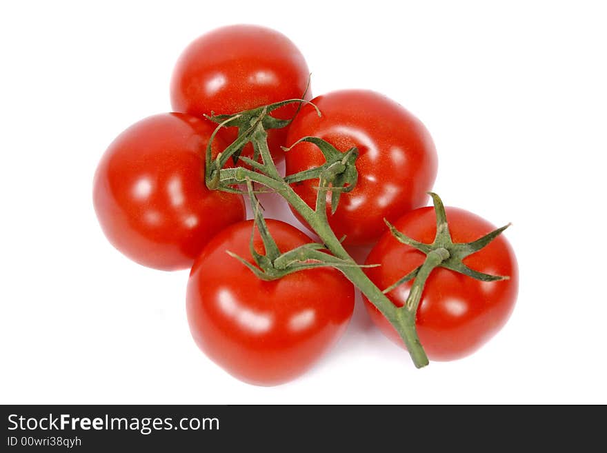 Red tomatoes isolated on white background