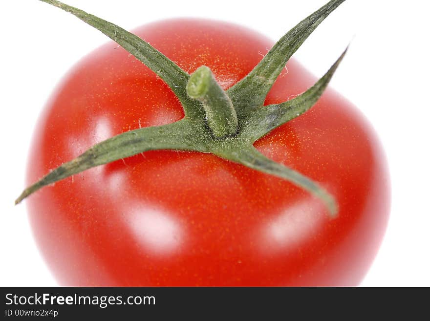 Red tomato isolated on white background