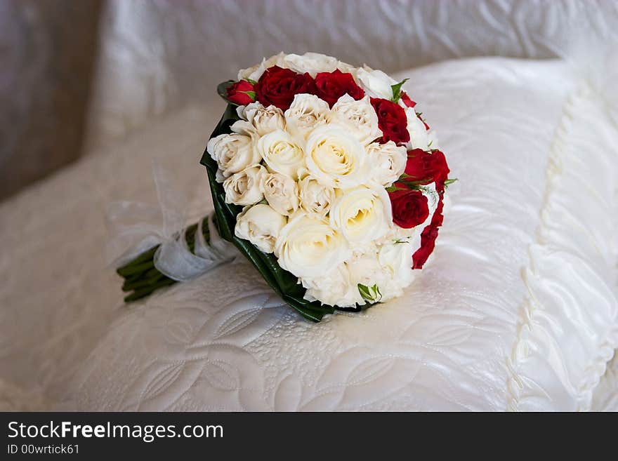 Bouquet of the bride on the bed. Bouquet of the bride on the bed