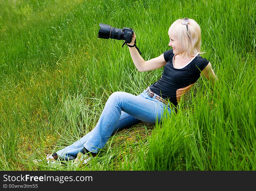 A young photographer with camera. A young photographer with camera