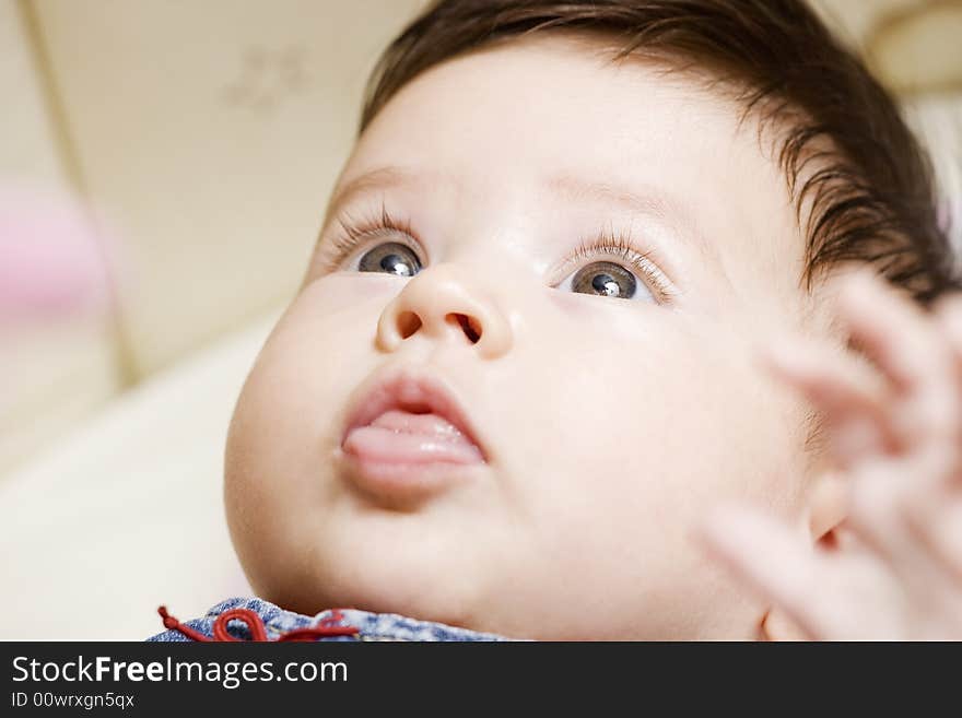 Sweet little baby looking up