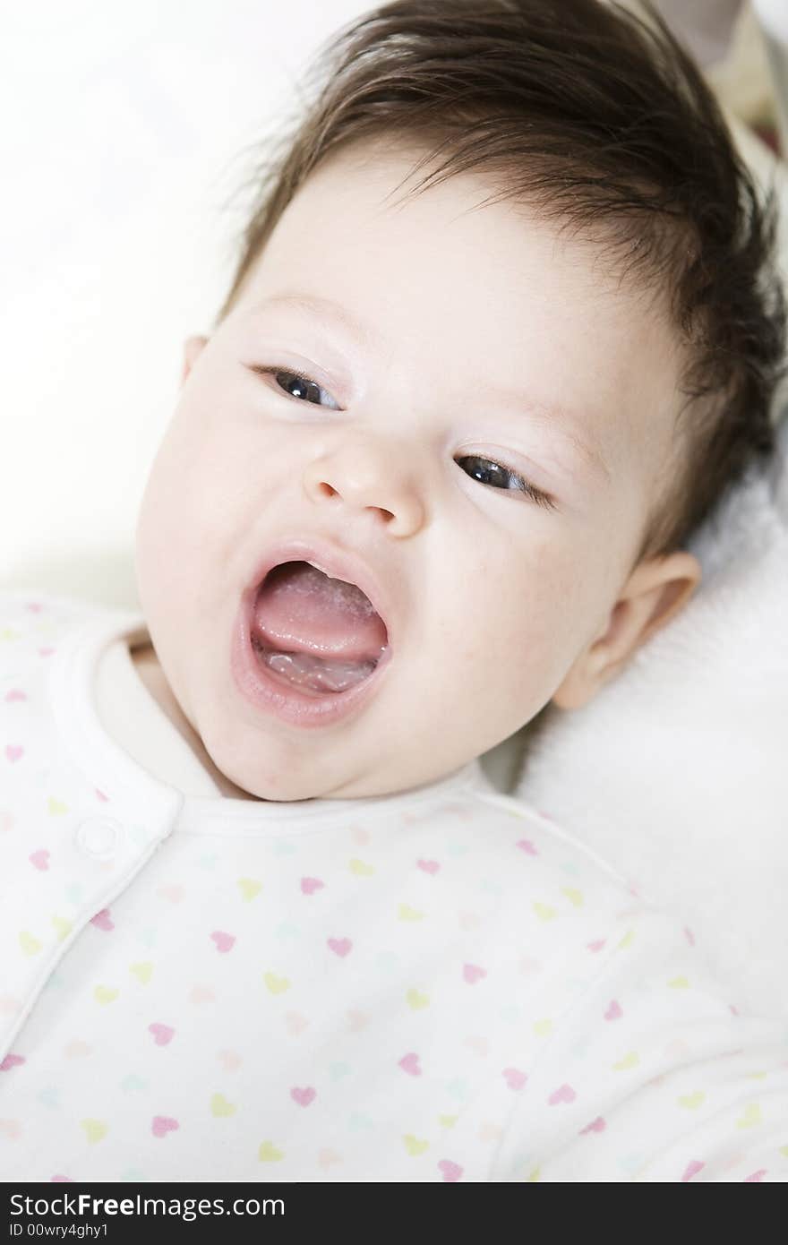 Sweet little baby girl smiling