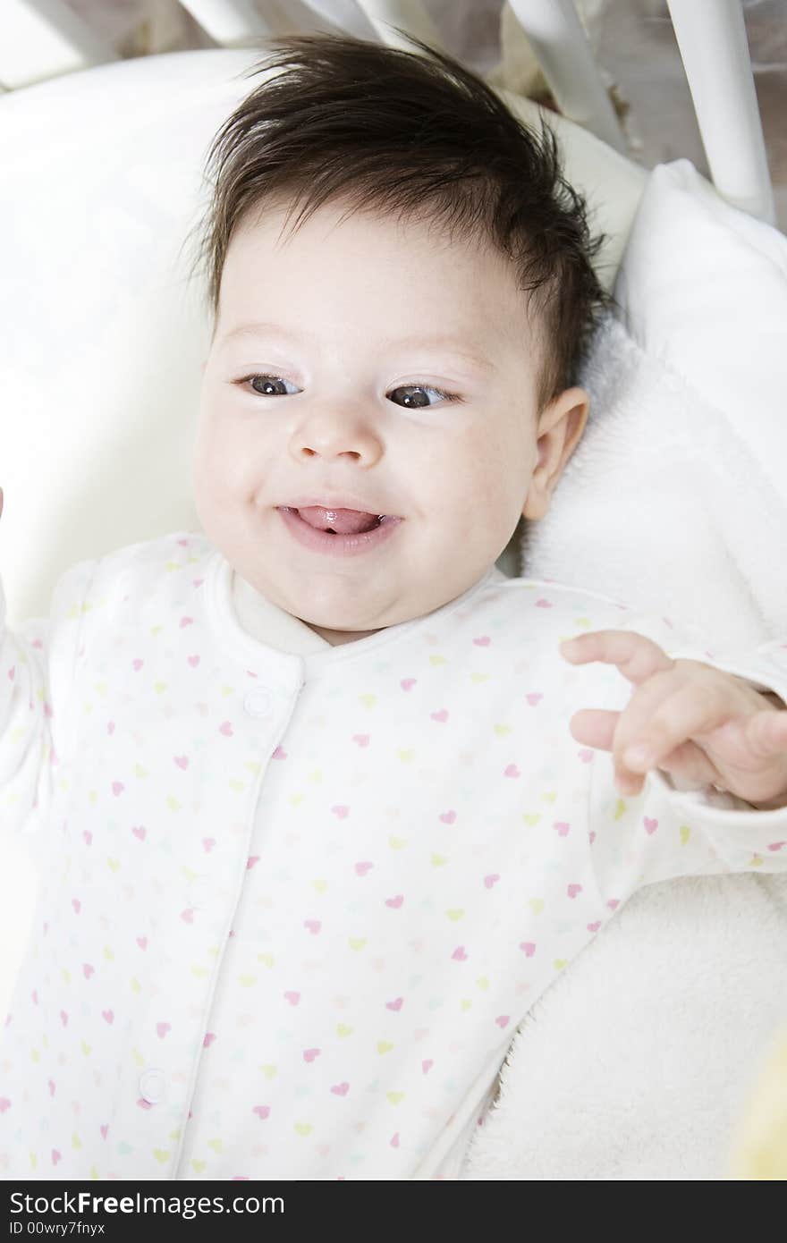 Sweet little baby girl smiling