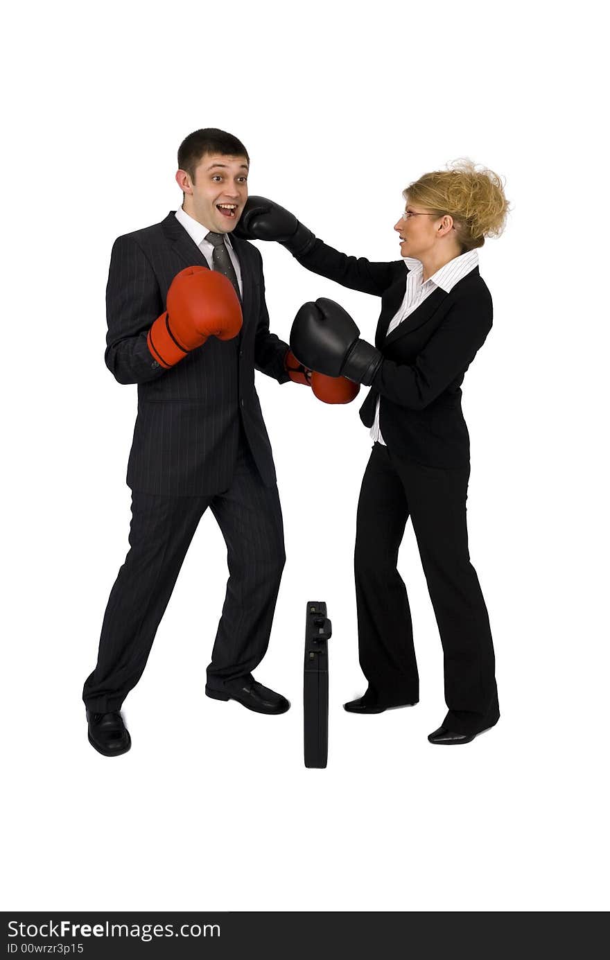 Businesswoman and businessman boxing.