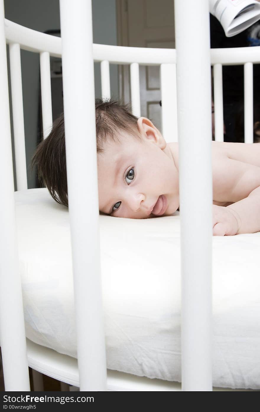 Sweet little baby in the bed