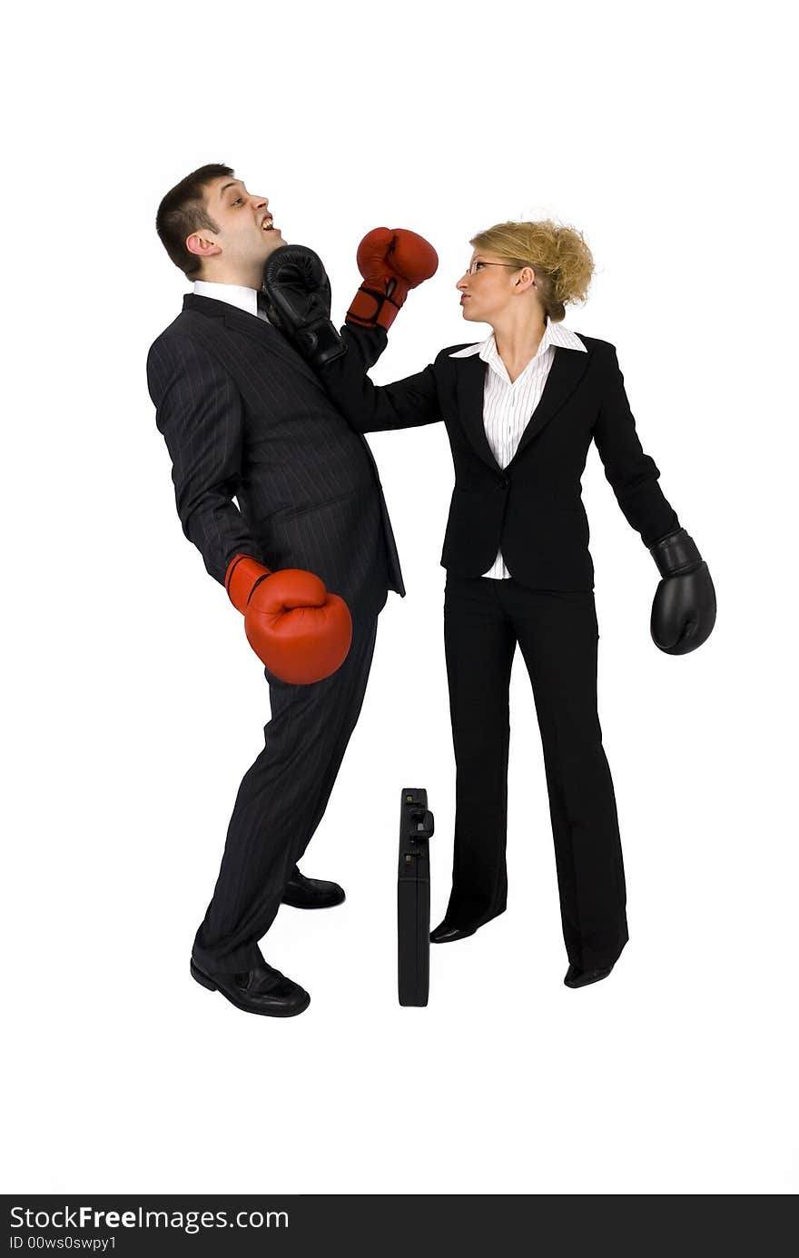 Businesswoman and businessman boxing.