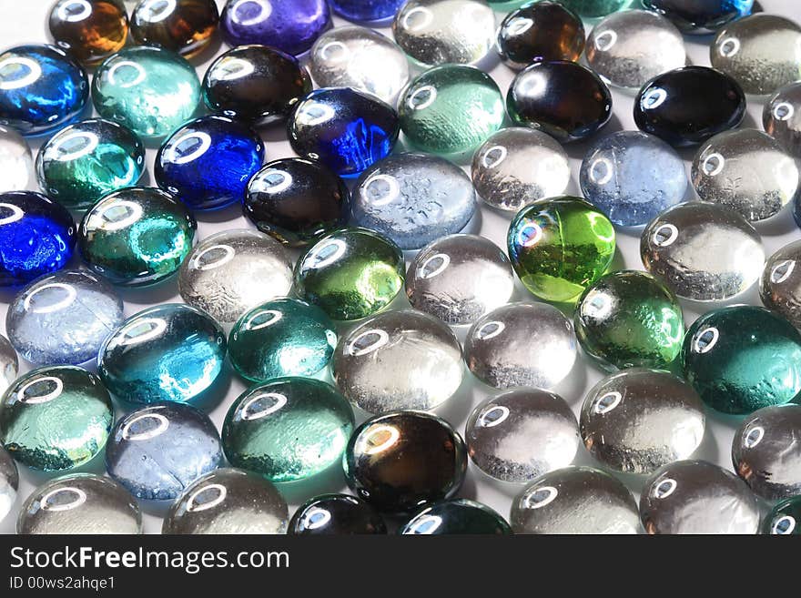 Glass decorative stones. A imagination`s background. Glass decorative stones. A imagination`s background