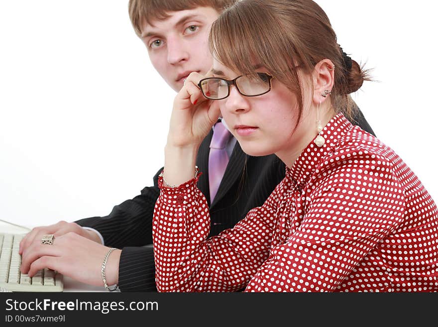 Group of business people working together. Shot in studio. Group of business people working together. Shot in studio.