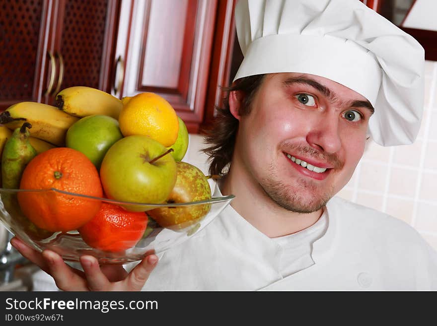 Cook cooking on the kitchen. Cook cooking on the kitchen