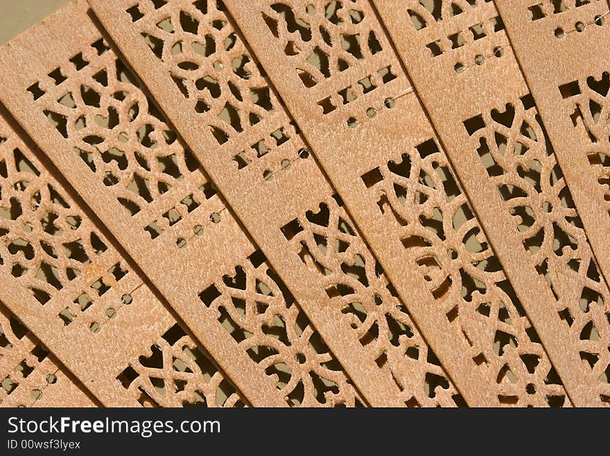 Close up view on chinese wooden fan. Close up view on chinese wooden fan