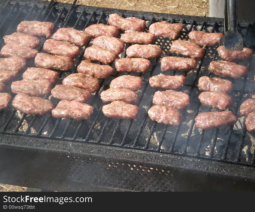 Turkish meatballs over hot charcoal fire. Turkish meatballs over hot charcoal fire