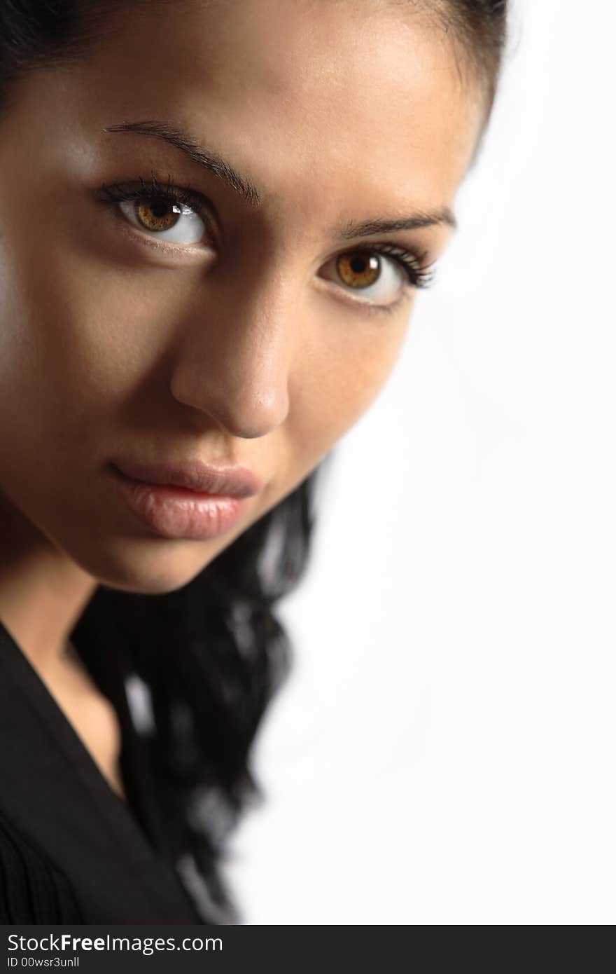 Professional brunette girl with big brown eyes looking into camera. Professional brunette girl with big brown eyes looking into camera.