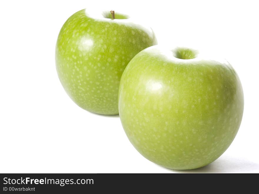 Green apple isolated on the white background. Back light source. Green apple isolated on the white background. Back light source.