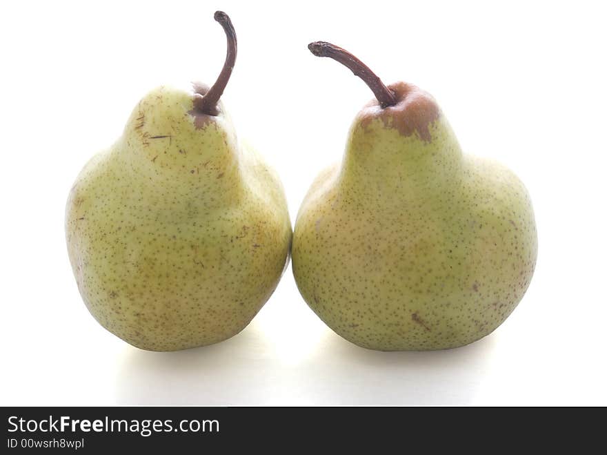 Double pears isolated on the white background with shadow.