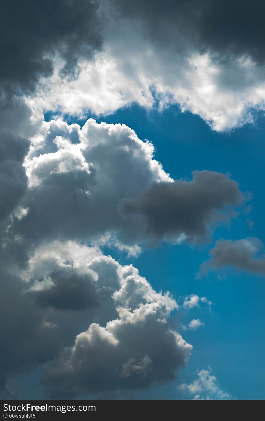 Contrast peaceful cloudscape, dramatic sky just after storm. Contrast peaceful cloudscape, dramatic sky just after storm