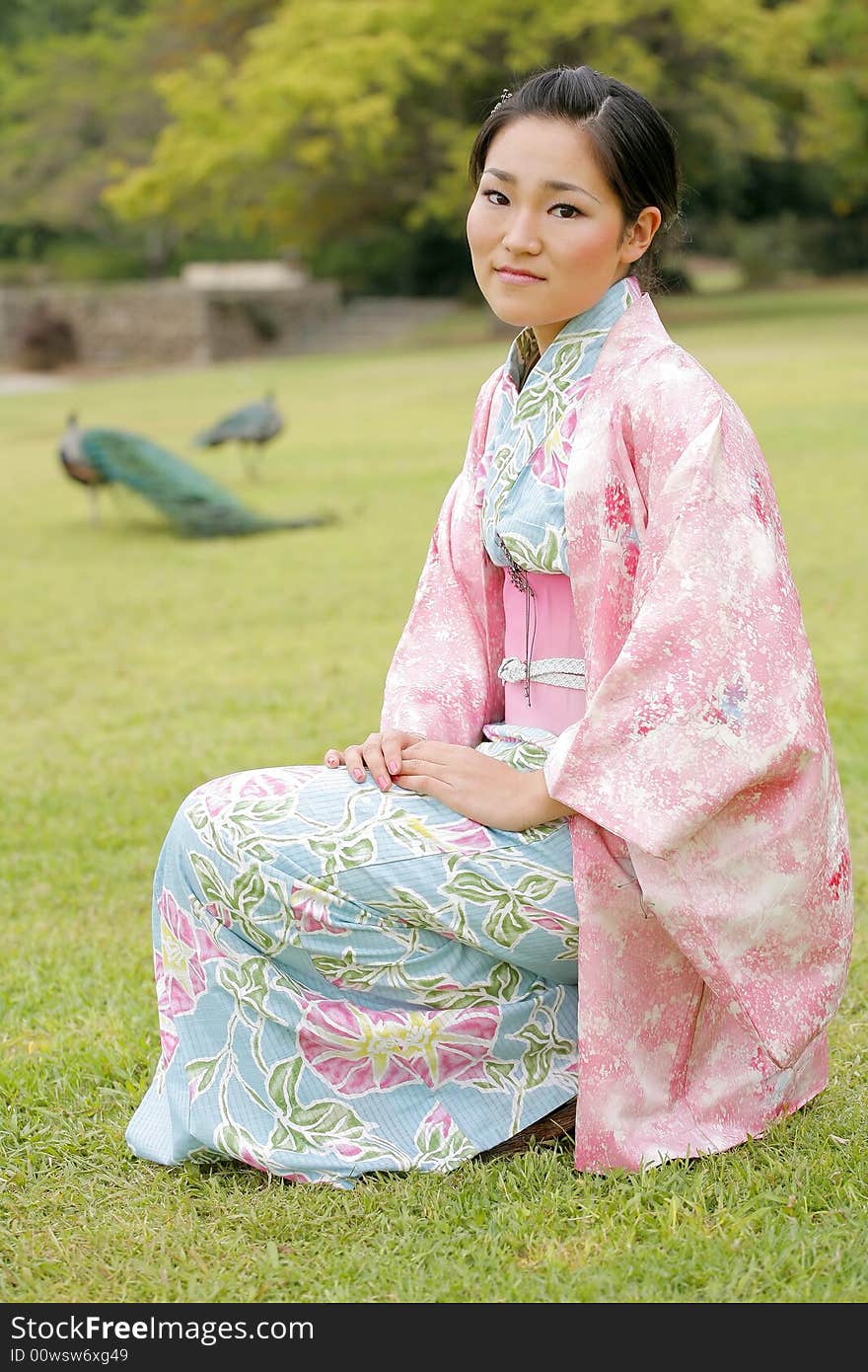 Young Asian girl in a traditional kimono. Young Asian girl in a traditional kimono