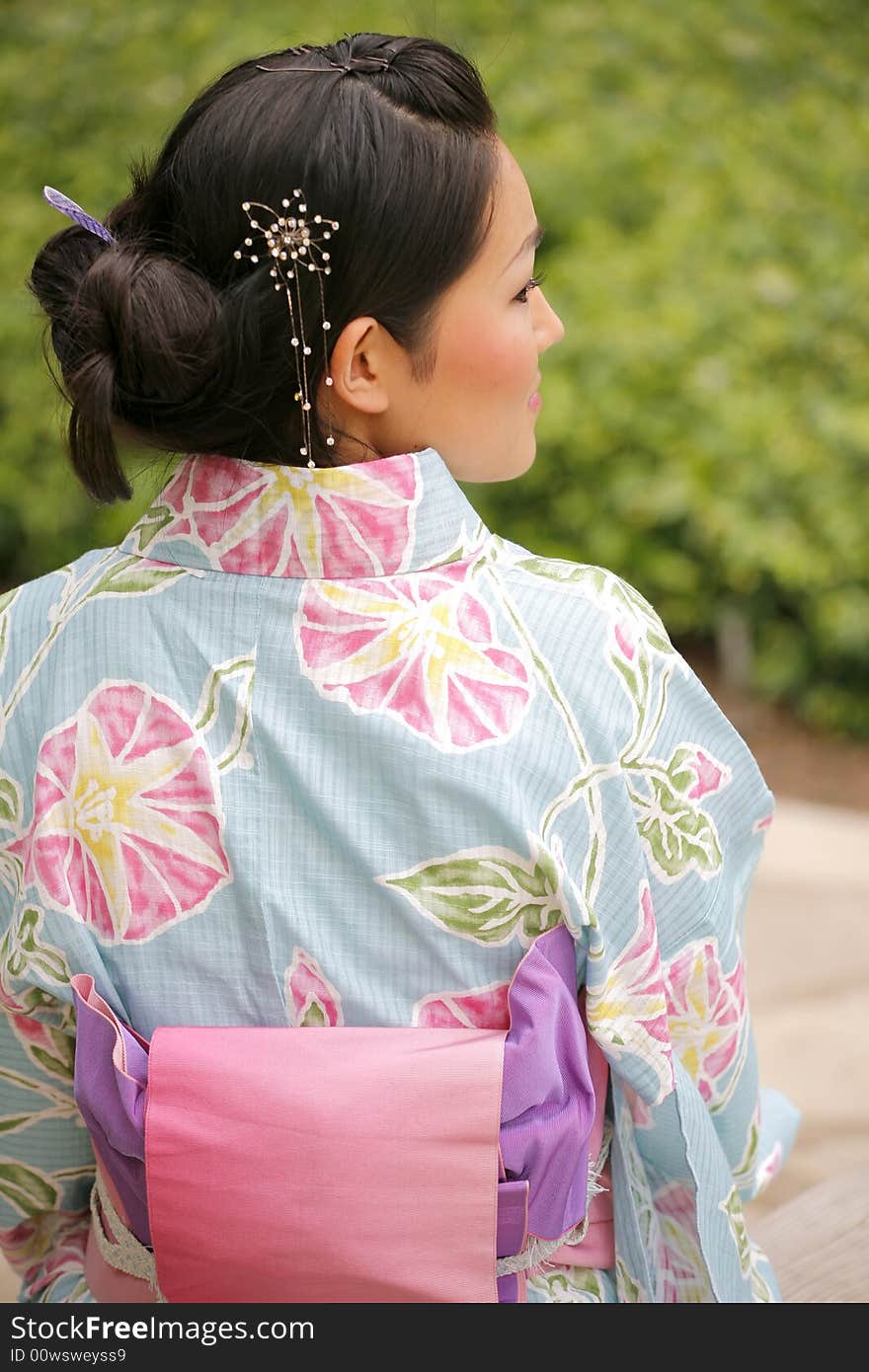 Young Asian girl in a traditional kimono. Young Asian girl in a traditional kimono