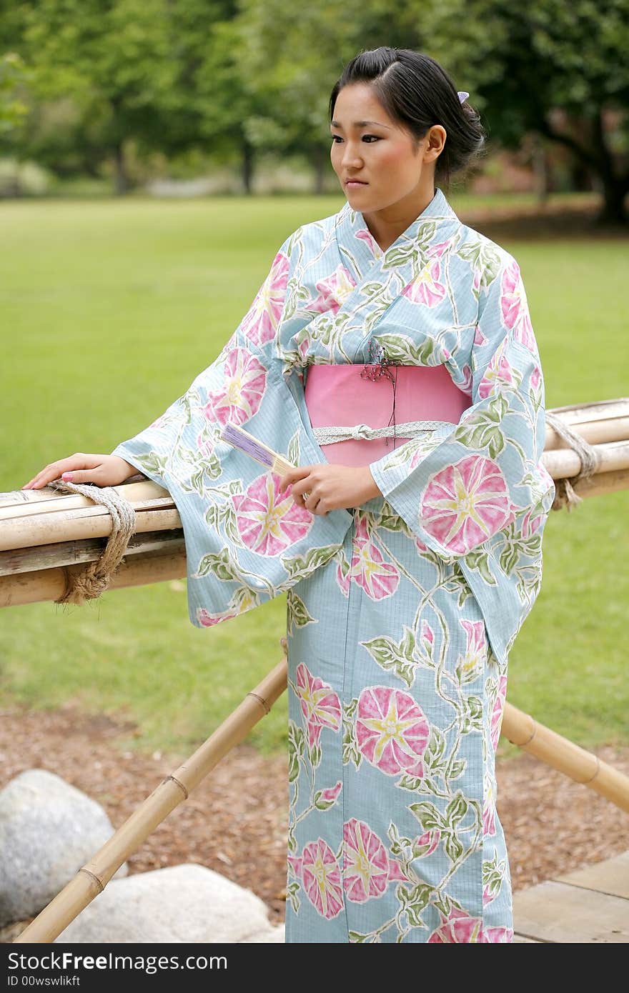 Young Asian girl in a traditional kimono. Young Asian girl in a traditional kimono