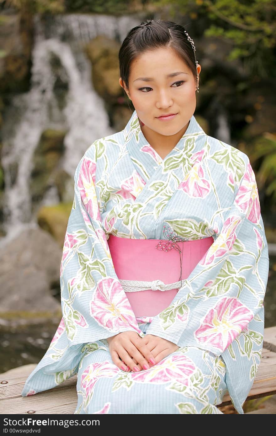 Young Asian girl in a traditional kimono. Young Asian girl in a traditional kimono